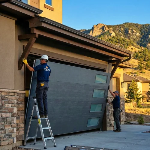 A professional garage door technician on an installation job.